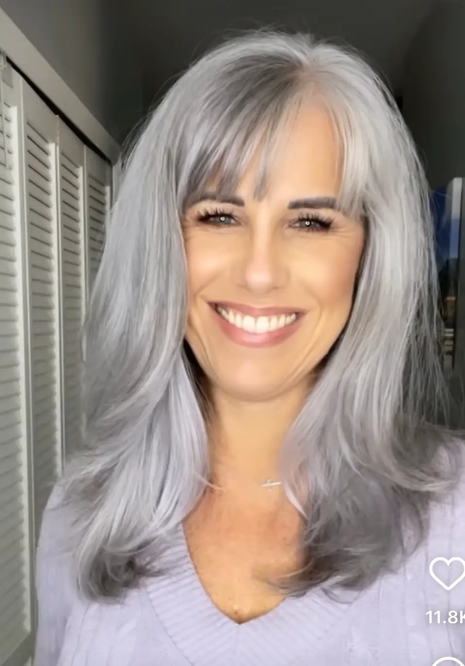 layered gray haircut with bangs