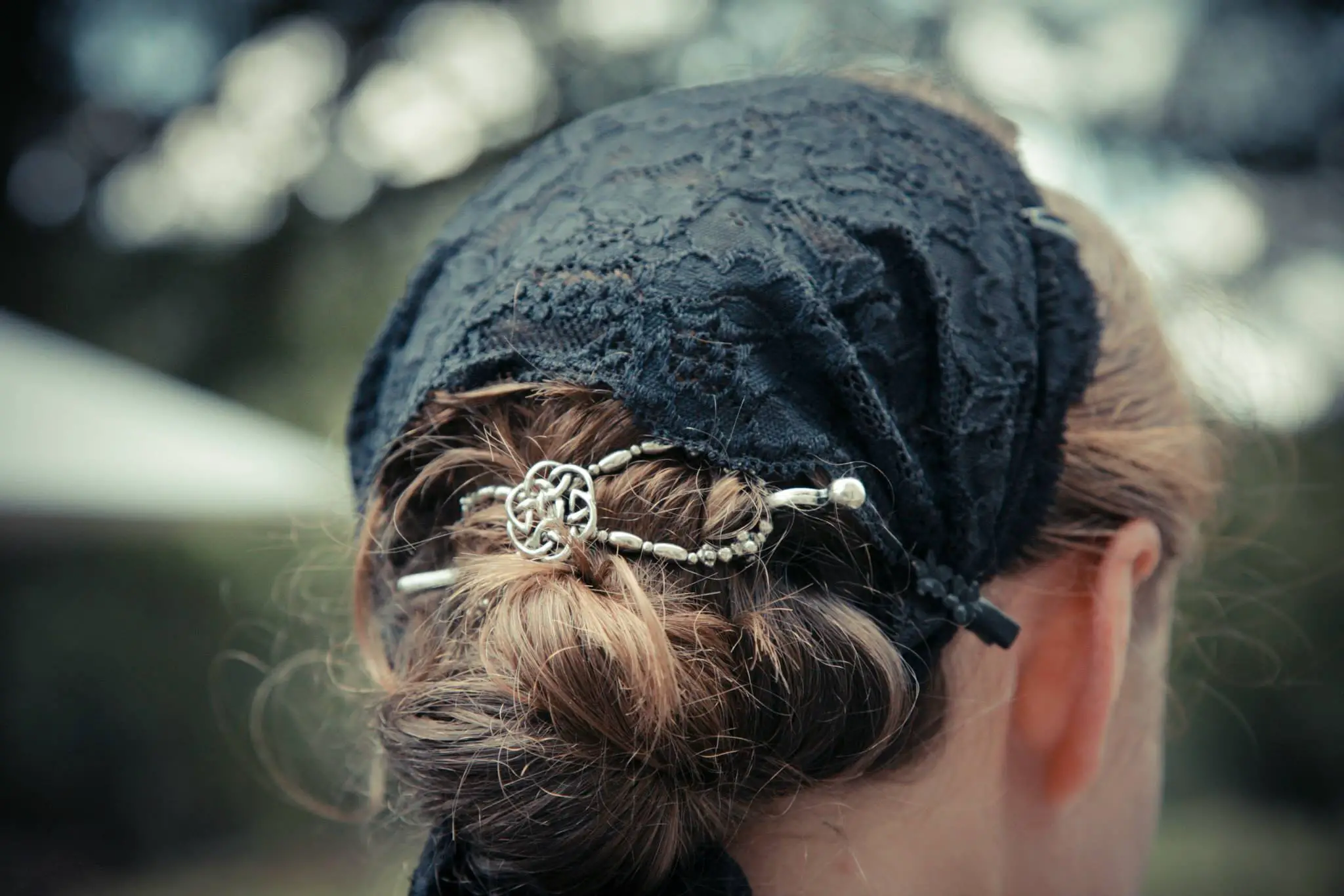 low messy bun in head covering