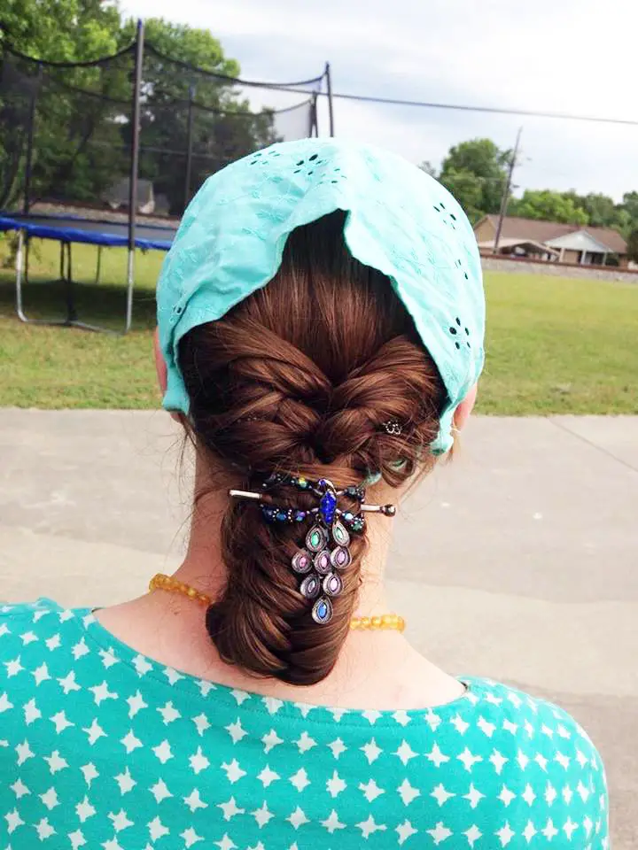 turquoise head covering fishtail braid