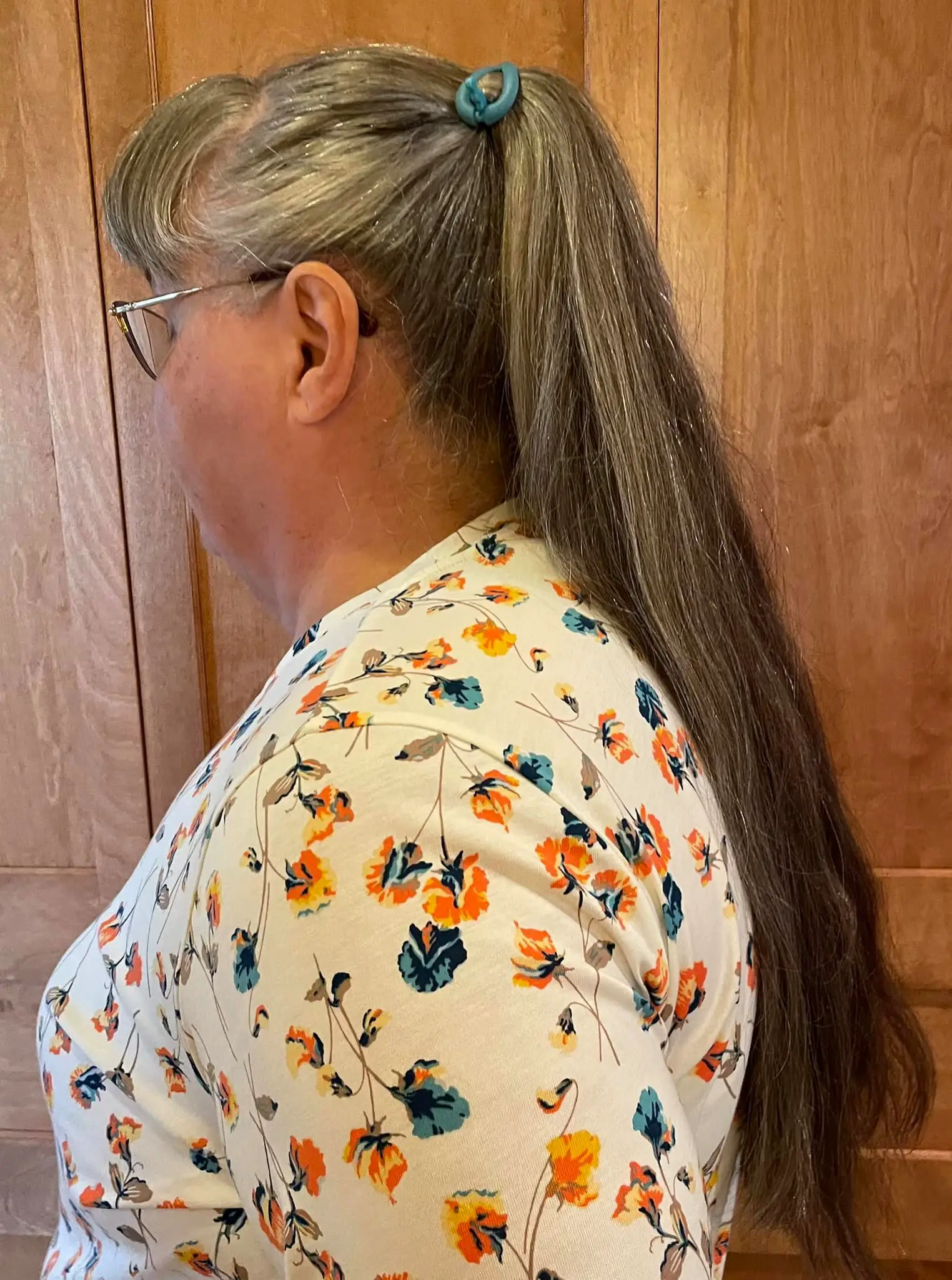 long gray ponytail sport side