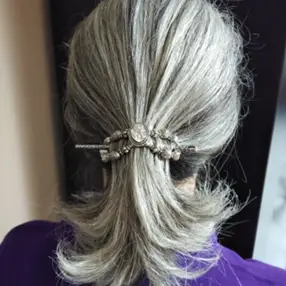 gray hair ponytail with hair clip
