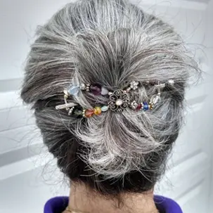 messy bun with colorful hair clip